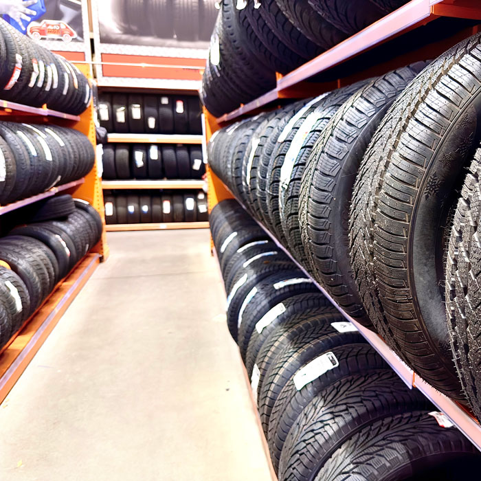 row of tires in tire shop